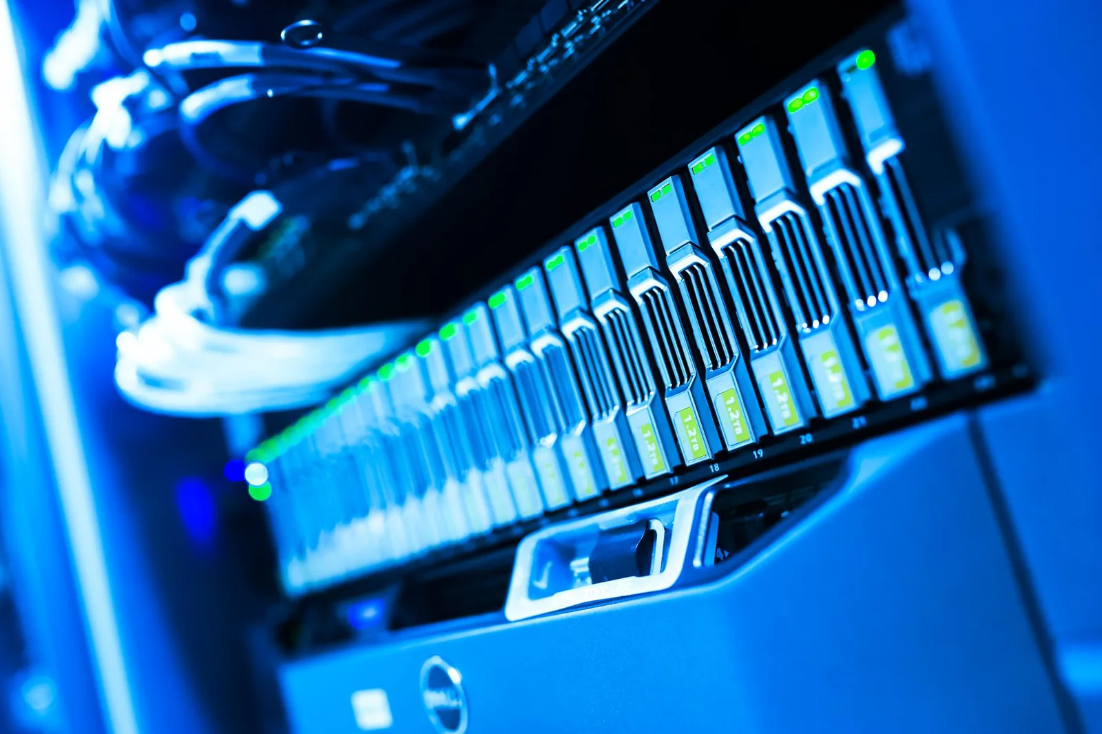 Close view of blue-lit server blades in a rack